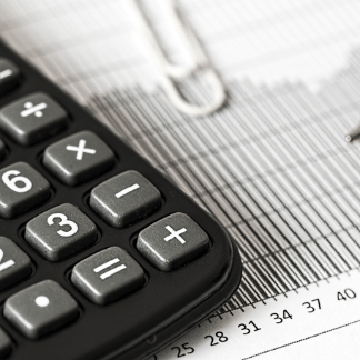 close up of calculator and document