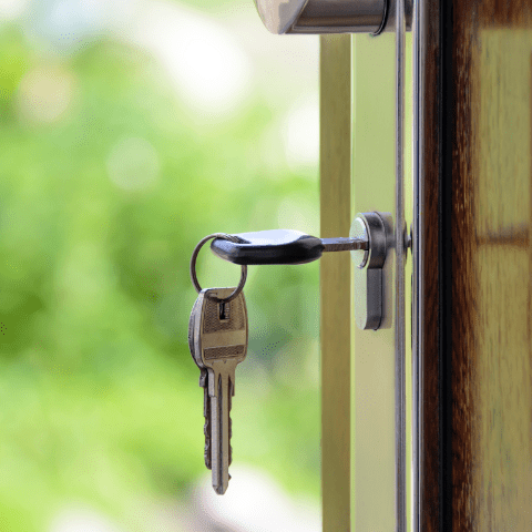 keys hanging in door of home